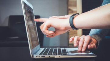 person using laptop